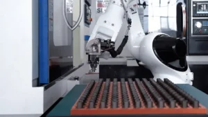 Automated CNC machine loading with robotic arm